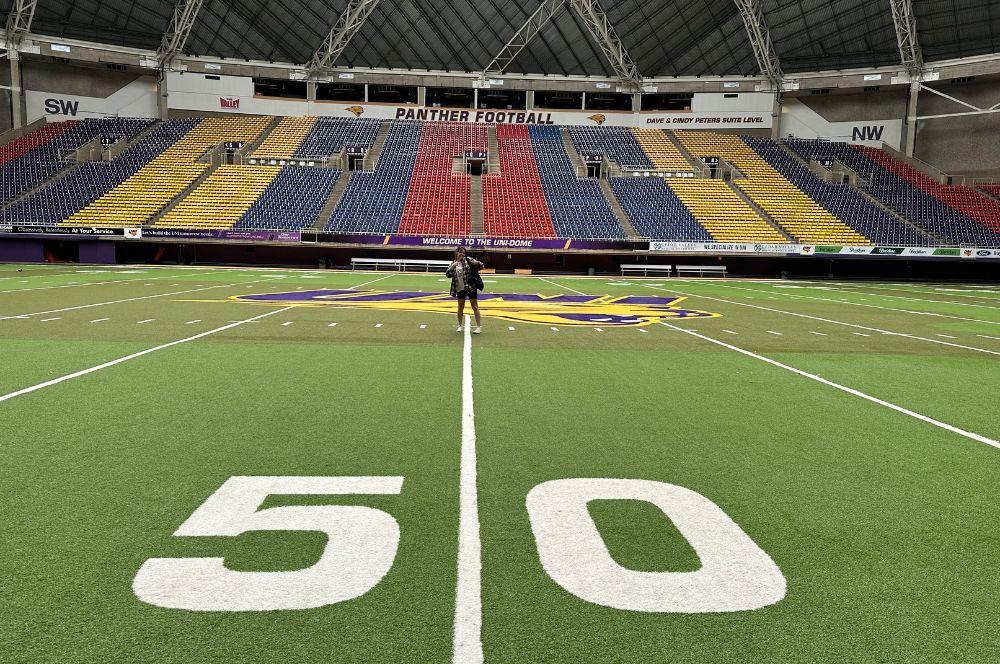 UNI Student on Dome Field