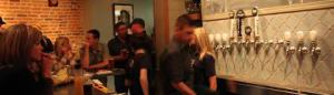 Single Speed Brewery horizontal behind the counter