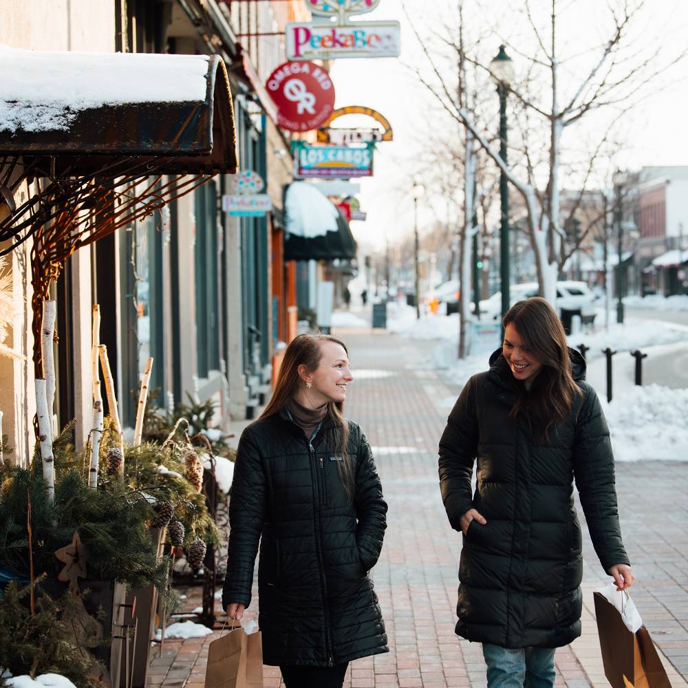two people shopping downtown cedar falls