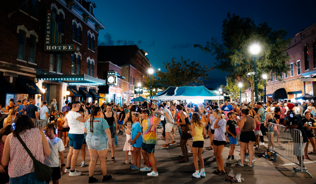 street crowded with people having fun