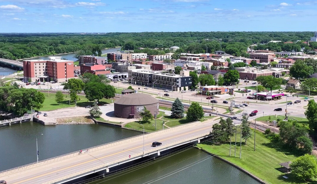 aerial view of round historic building, cedar river and city