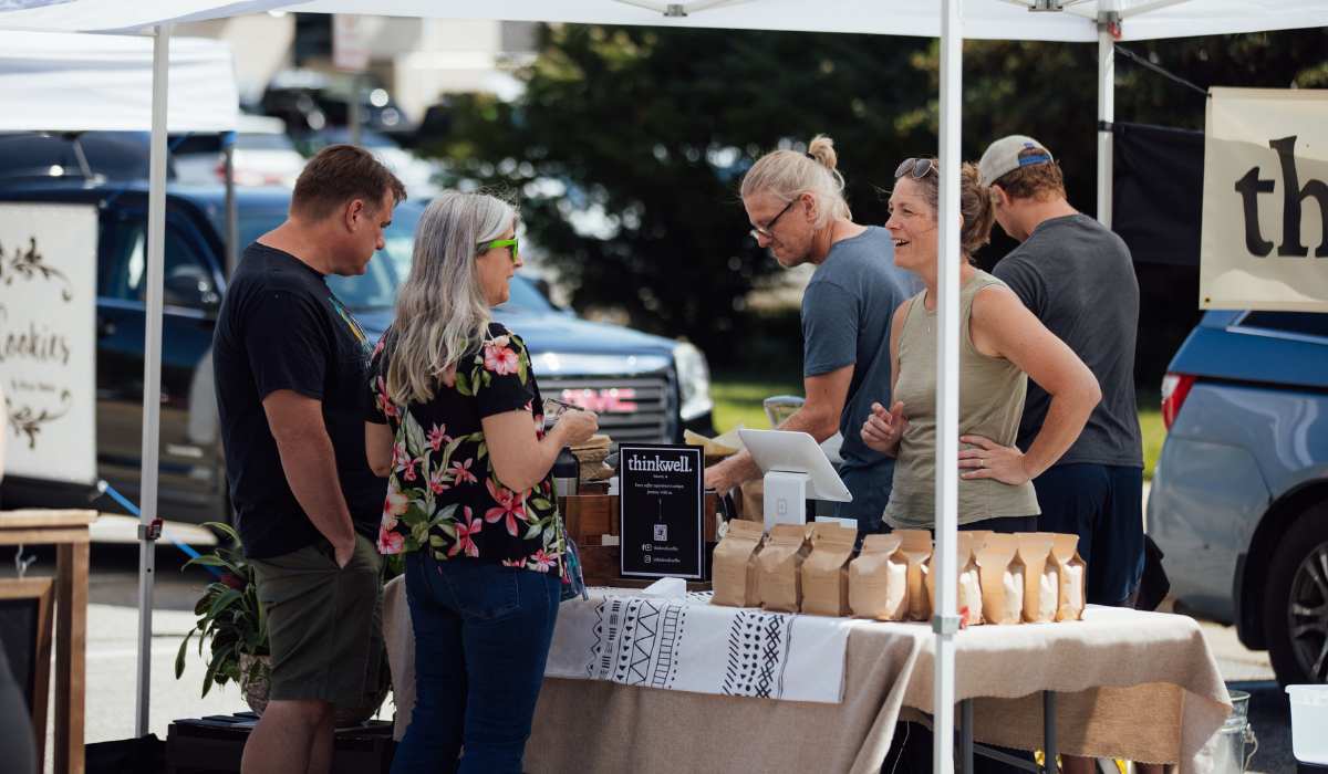 buying goods at a farmer's market