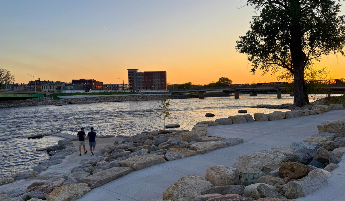 walking along the river boardwalk at sunset