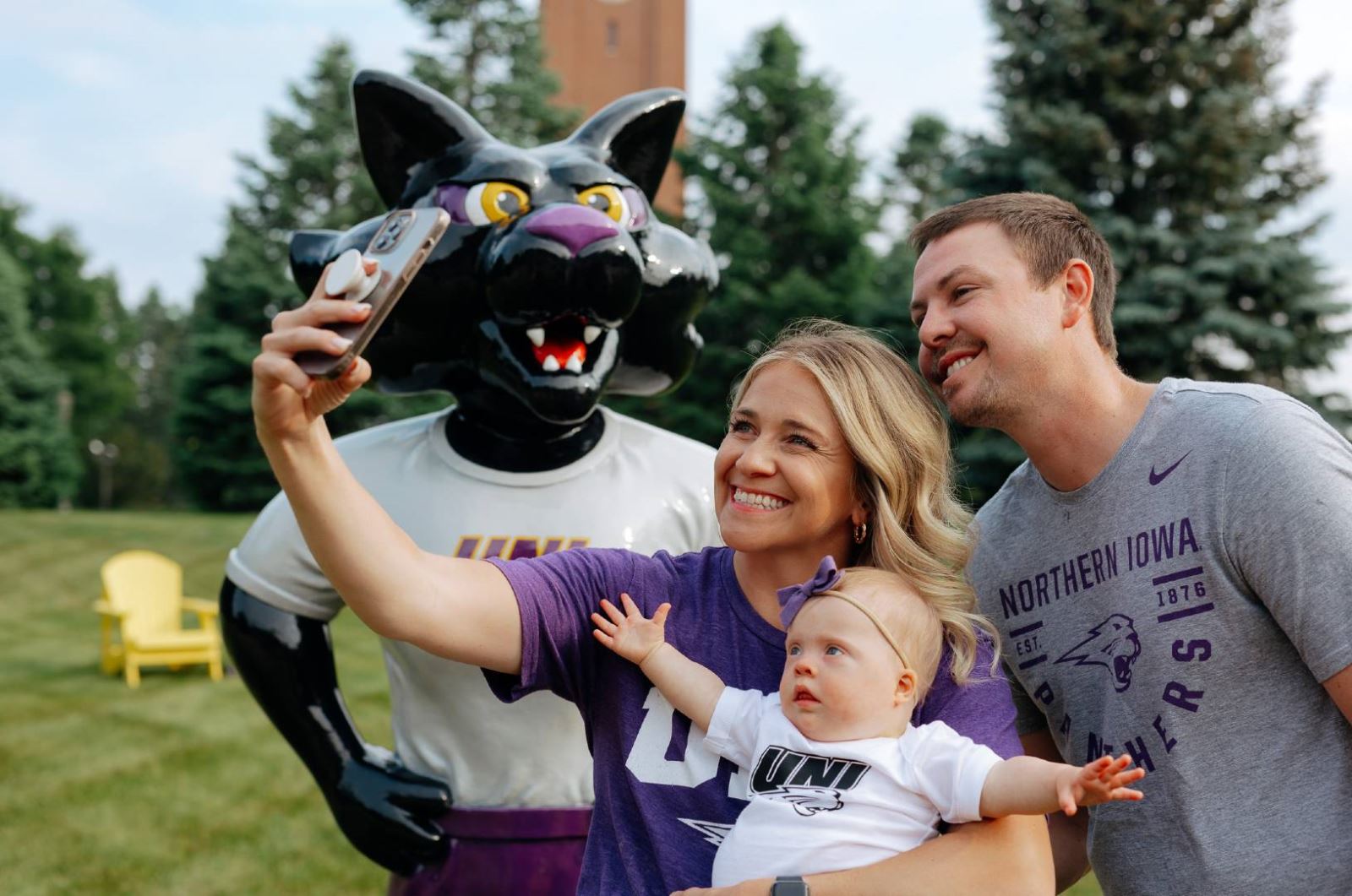 family with TC mascot