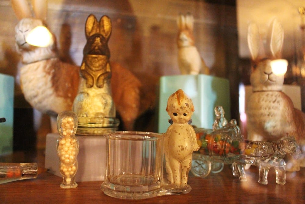 The Cedar Falls Historical Society's Cabinet of Curiosities includes antique candy dishes!