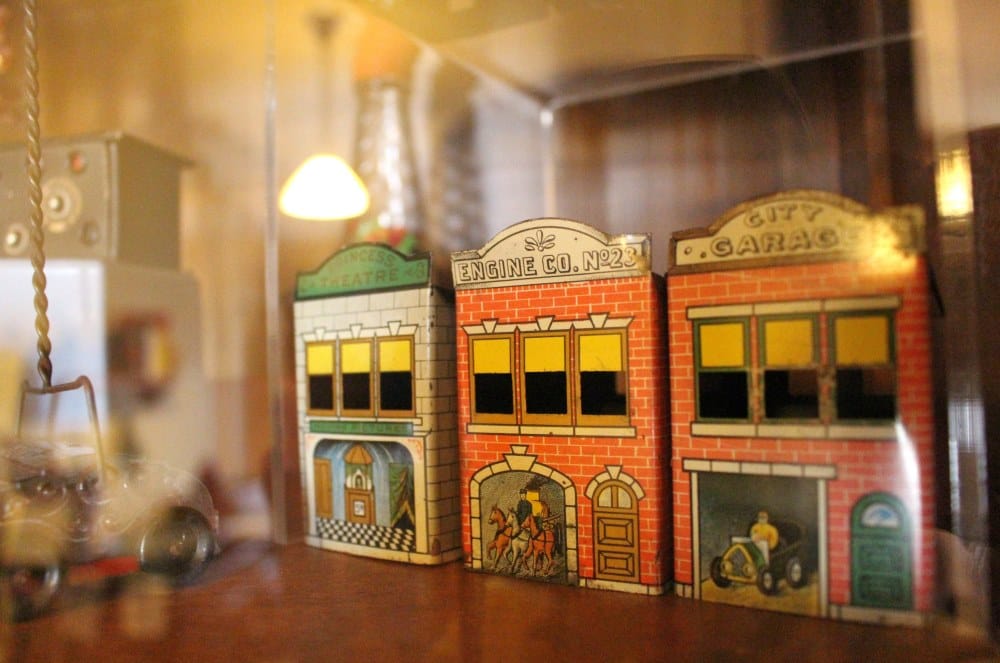 The Cedar Falls Historical Society's Cabinet of Curiosities includes antique candy dishes!